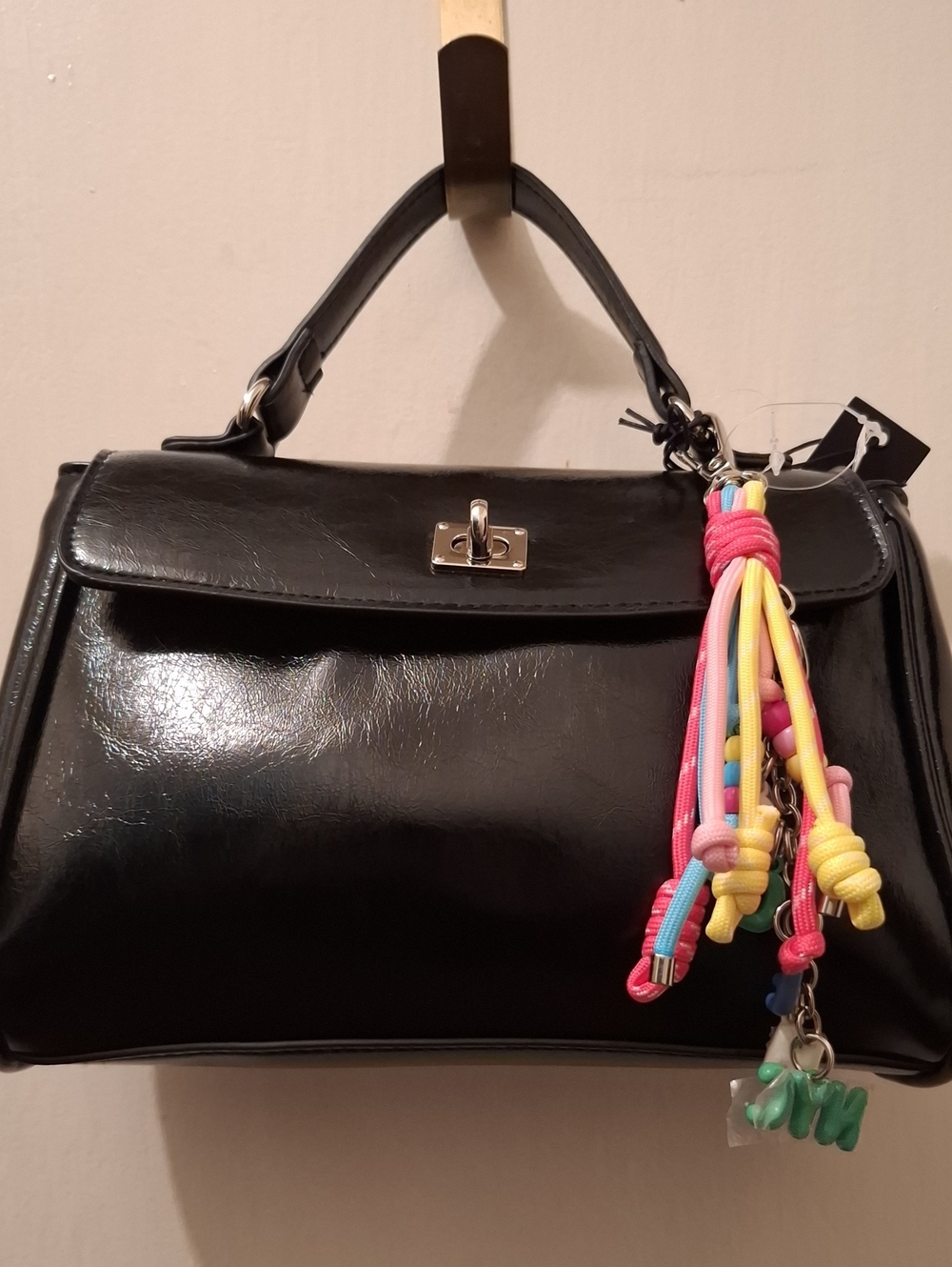 Black Top-Handle Satchel Bag with Colorful Tassel